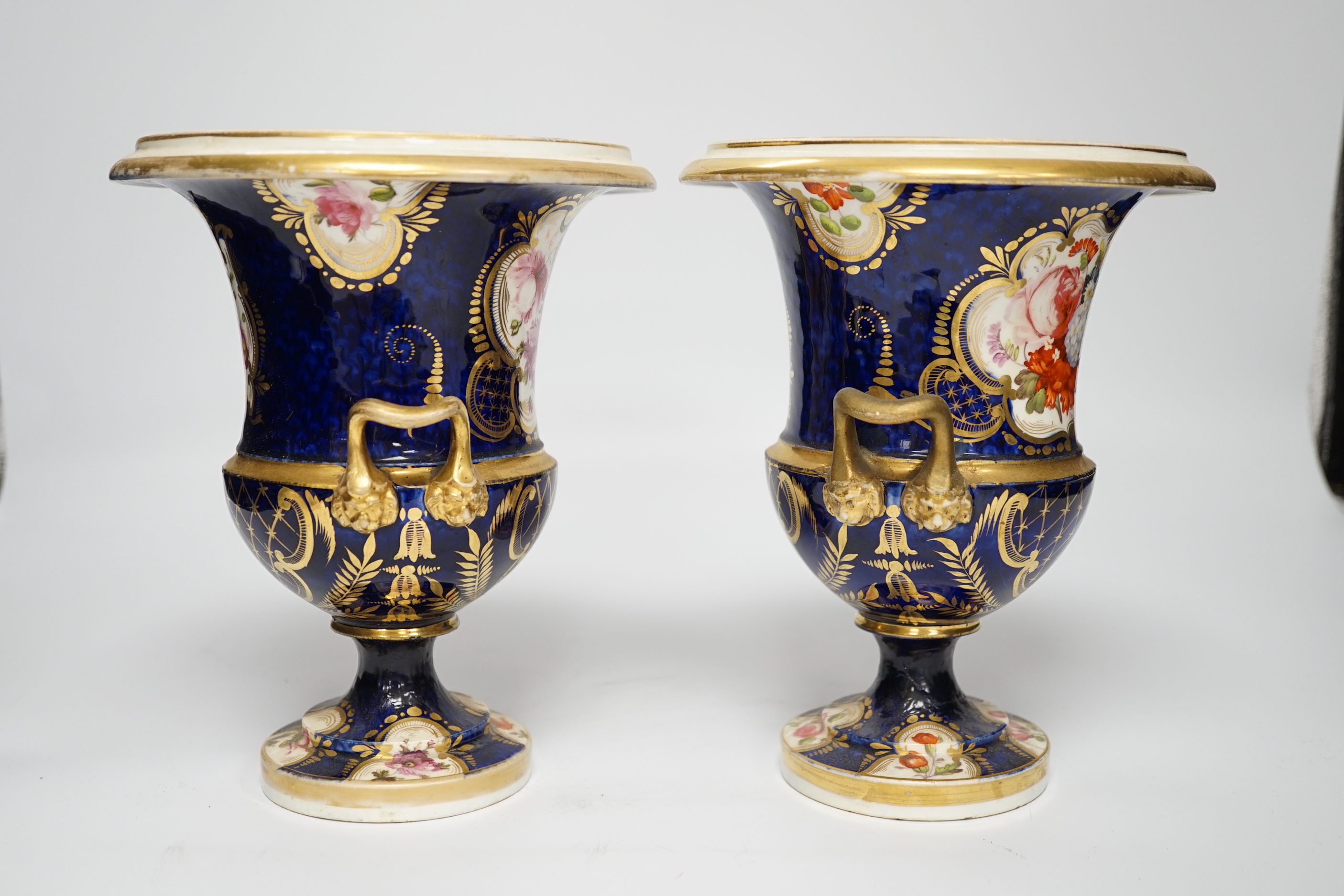 A pair of early 19th century English porcelain vases, scale blue ground, 19cm